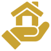 Gold house in a hand